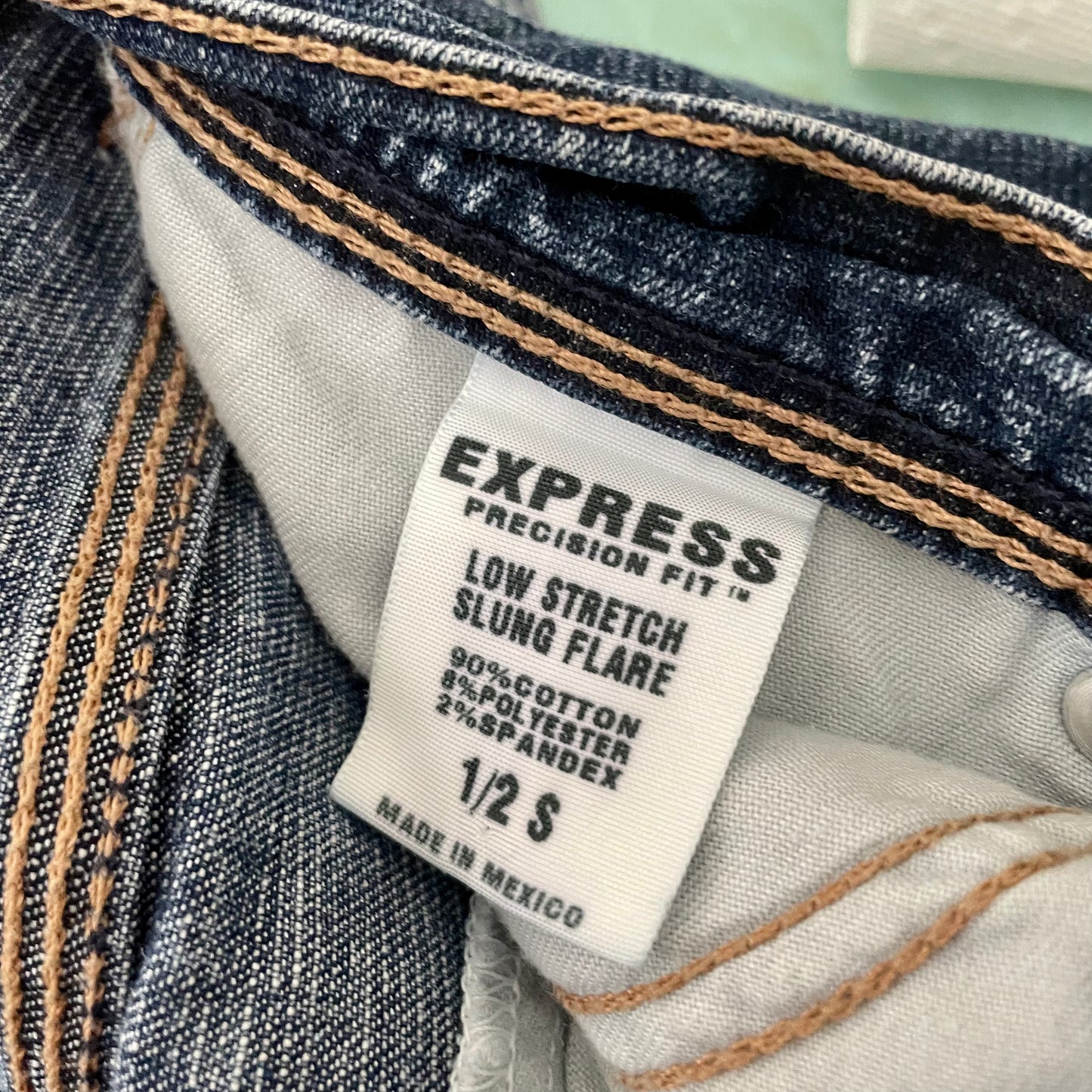 express boot cut dark wash jeans 1/2s